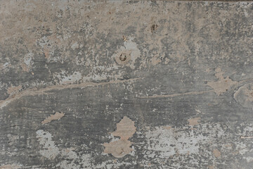 Old wooden texture background, close-up. Peeling paint on wood. Wooden background from old painted board. The facade of the old building or the floor, the step of an abandoned house. Place for text