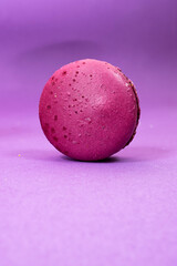 French purple Macaron Cookie isolated on purple background