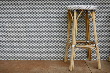 vacant bar stool made of bamboo in earth tones