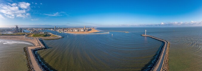 Drone panorama over the harbor and skyline of the Belgian city of Oostende