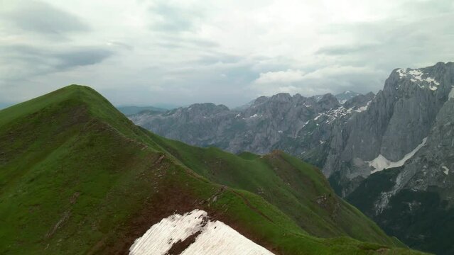 Flying over ridge revealing  Karanfil mountain group, Albania