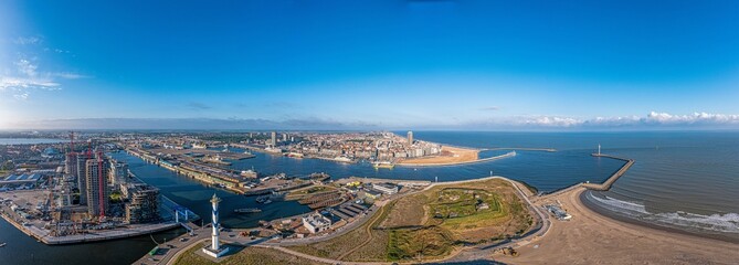 Drone panorama over the harbor and skyline of the Belgian city of Oostende - obrazy, fototapety, plakaty