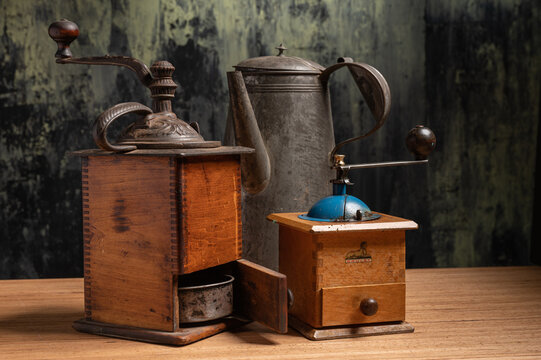 Assorted antique old fashioned vintage coffee grinders and coffee pot hand cranked grinder for coffee beans