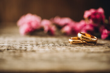 wedding rings and flowers