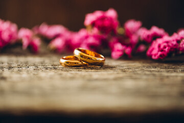 wedding rings and flowers