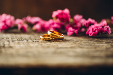 wedding rings and flowers. Love concept. Couple rings