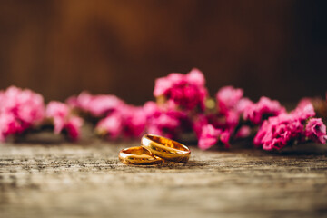 wedding rings and flowers