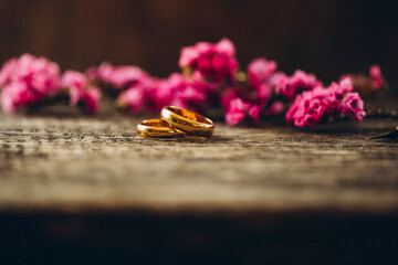 wedding rings and flowers