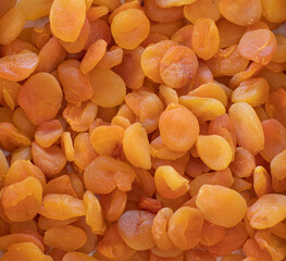 background of dried apricots, top view