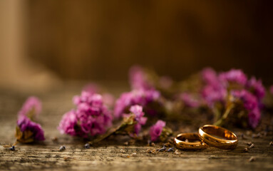 Obraz na płótnie Canvas Romantic lovers. Wedding day. wedding rings on a bouquet of flowers. Photo. Background. Decor. 