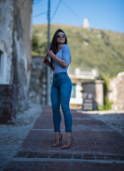 girl in jeans and décolleté