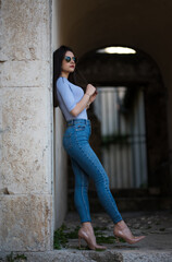 Fototapeta na wymiar girl in jeans and décolleté