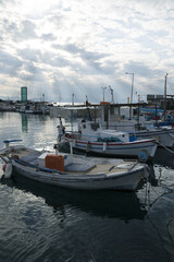 Fototapeta na wymiar summer greek port with fishing boats and pleasure boats
