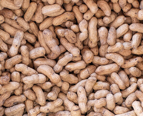 background of nuts peanuts in shell, top view