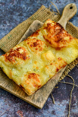   Italian  Focaccia  four cheese with crispy crust   Full 72 hour pizza dough   fermentation   method. Roman style pizza slice 