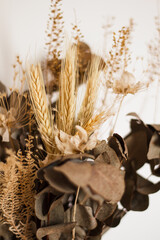 Dried wheat and eucalyptus vase.