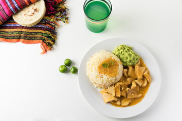 Tiras, plato típico tradicional de guatemala hecho con panza de res en una salsa de miltomate en...