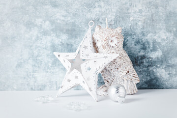Christmas star on bright wooden background. Close up. Copy space.