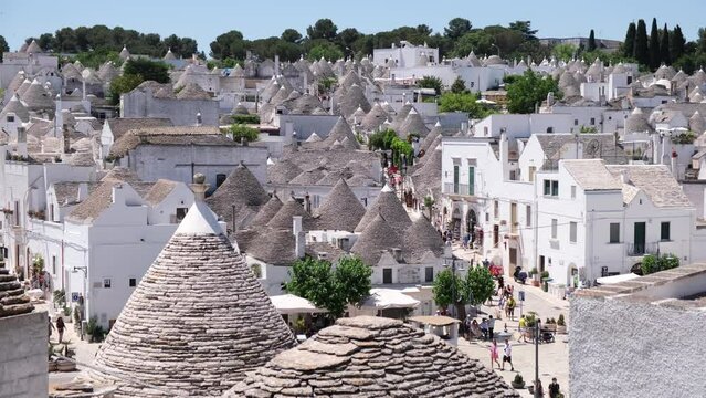 Street scene from the famous little town of Alberobello, one of the most touristic cities in Italy 