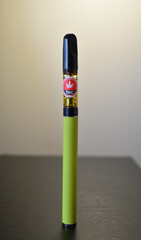 Green Marijuana Vaporizer with THC cartridge