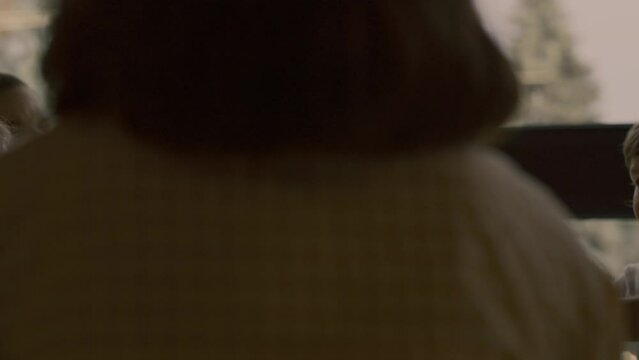 Diverse teenagers insulting sad classmate after classes. Children teasing boy.