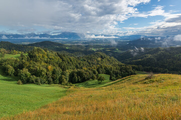 Naklejka premium Church on top of the hill in Slovenian countryside