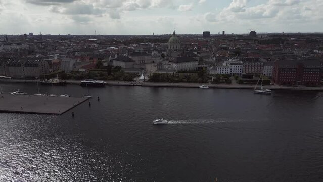 Amalienborg in Copenhagen seen from above following small boat 