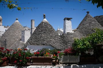 Street scene from the famous little town of Alberobello, one of the most touristic cities in Italy