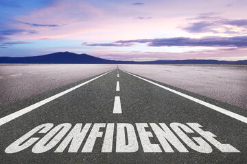 Confidence text written on a highway.