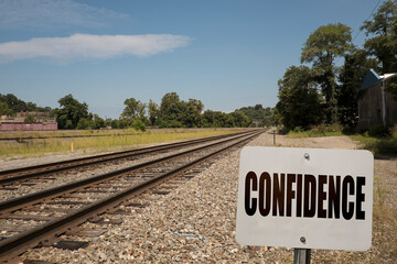 Confidence text written on a sign.
