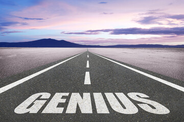 The word Genius written on a road for brilliance and talent concept.