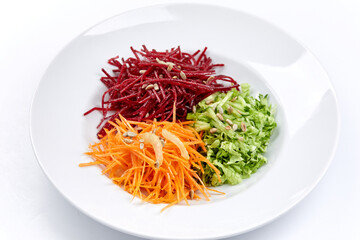 raw vegetables on the white plate