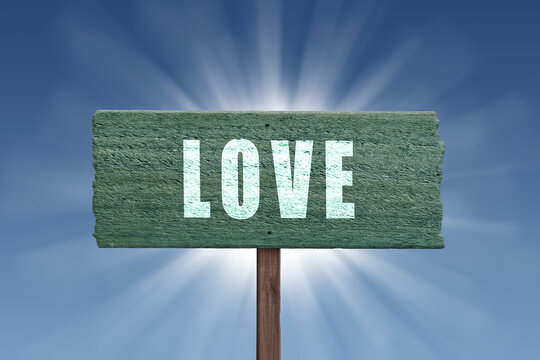 Love sign on blue sky background.