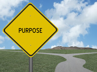 Motivational Purpose sign with road in the background.