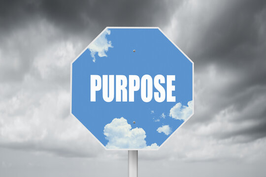 Positive purpose sign on a stormy background.