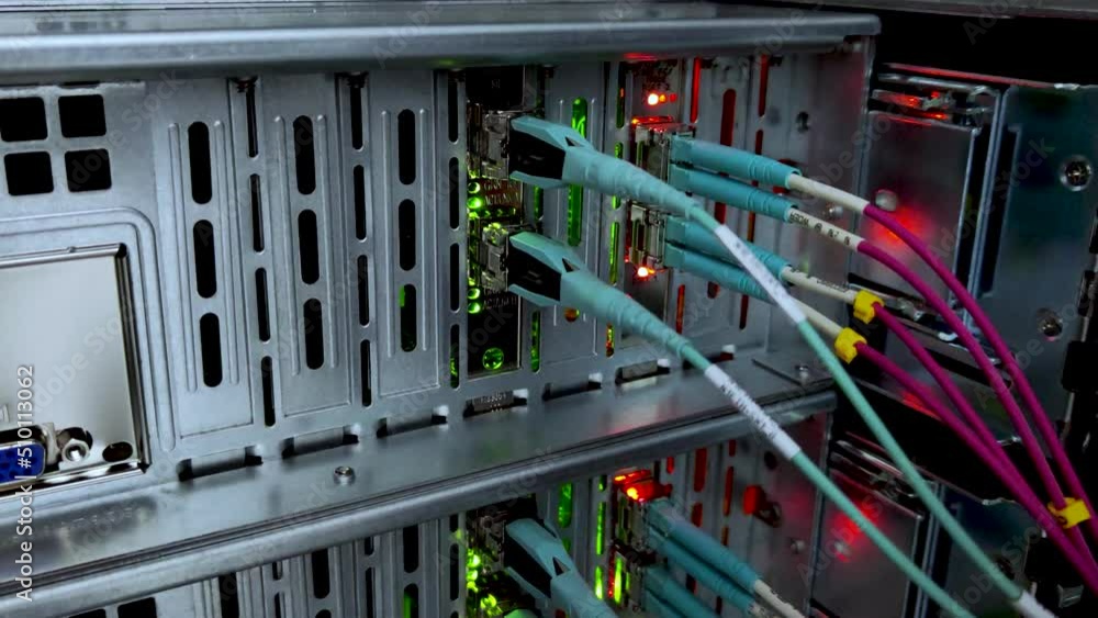 Aufkleber severs computer in a rack at the large data center. optical fiber.