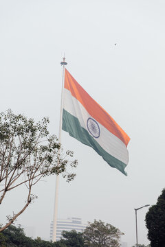Huge Indian flag in Delhi against a smoggy sky