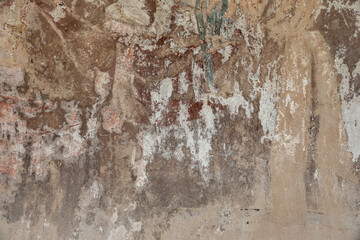 Texture of an old peeling plastered wall