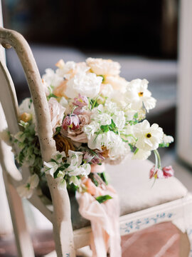 Bouquet Of White Flowers On The Chair
