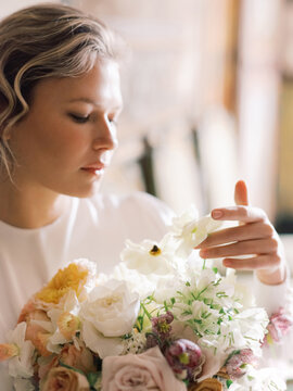 Blond Woman Enjoying Flowers Odor