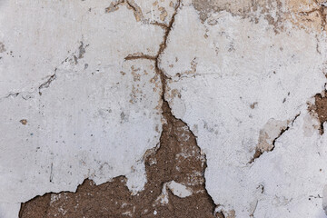 Texture of an old peeling plastered wall