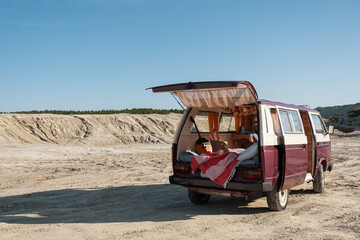 Opened van parked in desert