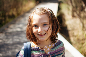 Child smiling at camera 