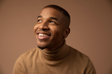 Happy Man Smiling in Portrait Looking at Light