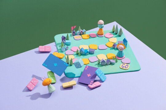 Various board games and many figurines background