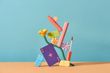 Balancing lipstick on flower and cards board