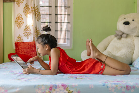 Little girl using a tablet