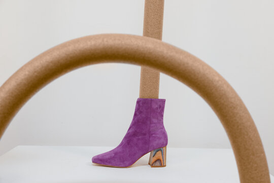 purple boot with arched shape in front