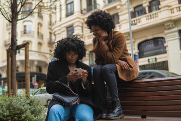 Friends sitting on a bench