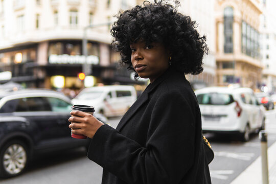 Black woman having coffee
